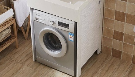为什么滚筒洗衣机要设计成上排水？